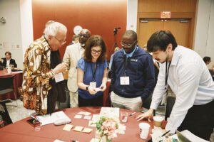 Rev. Greg Johnson, Kayla Shapira-Stern, Ian Schwalen participate in Summit exercise